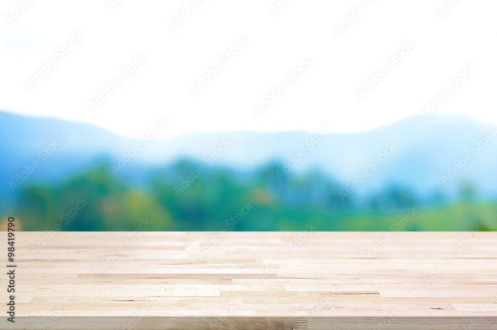 Fototapeta premium Wood table top on blur mountain background