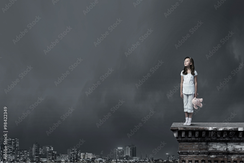 Little girl with bear