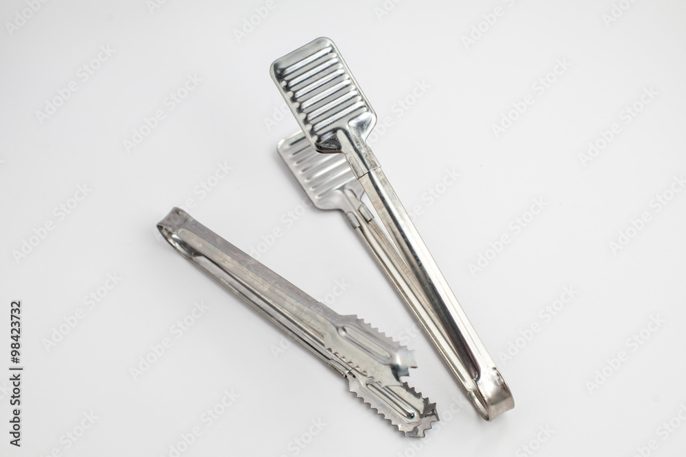 two ice tong on the white background two ice tong on the white background