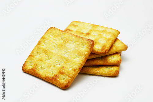 cracker and cookie on white background