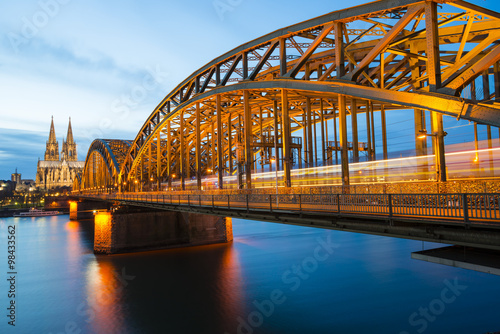 Germany, North Rhine-Westphalia, Cologne, view to Cologne Cathedral and Hohenzollern Bridge at evening twilight