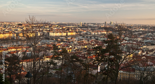Prague city panorama from Petrin hill duiring late autumn afternoon with blue sky © honza28683