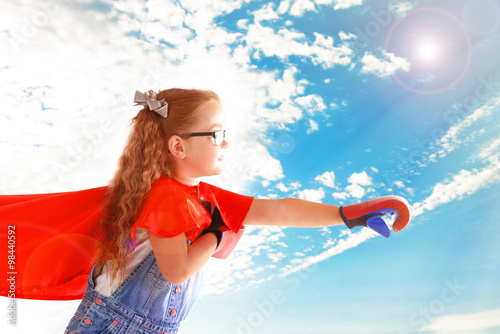 Fancy superhero girl with b...