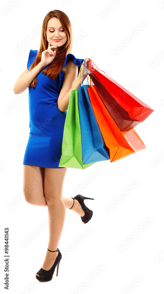 Young pretty woman with shopping packages isolated on white Young pretty woman with shopping packages isolated on white