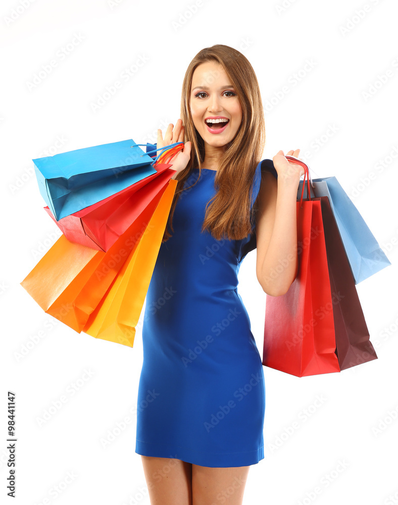 Young pretty woman with shopping packages isolated on white