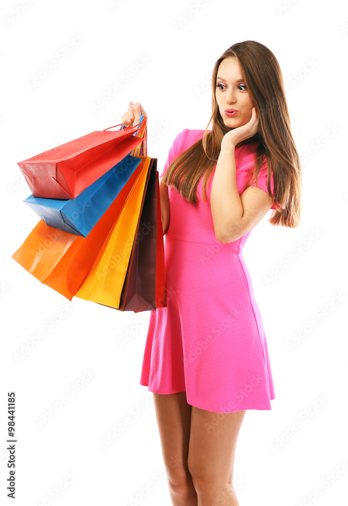 Young pretty woman with shopping packages isolated on white Young pretty woman with shopping packages isolated on white