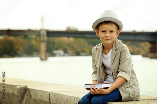 Little boy on the riverside