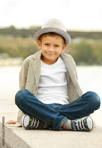 Little boy on the riverside