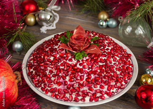 Christmas salad with pomegranate and pastrami