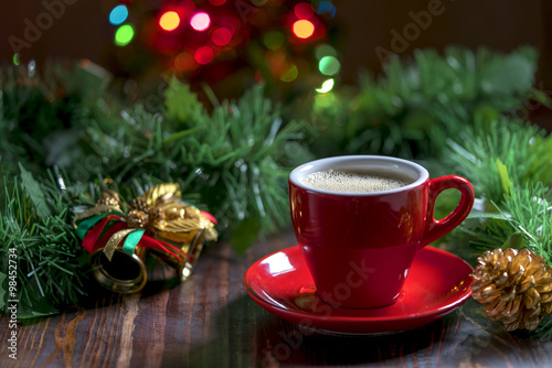 Cup of coffee with Christmas decorations.