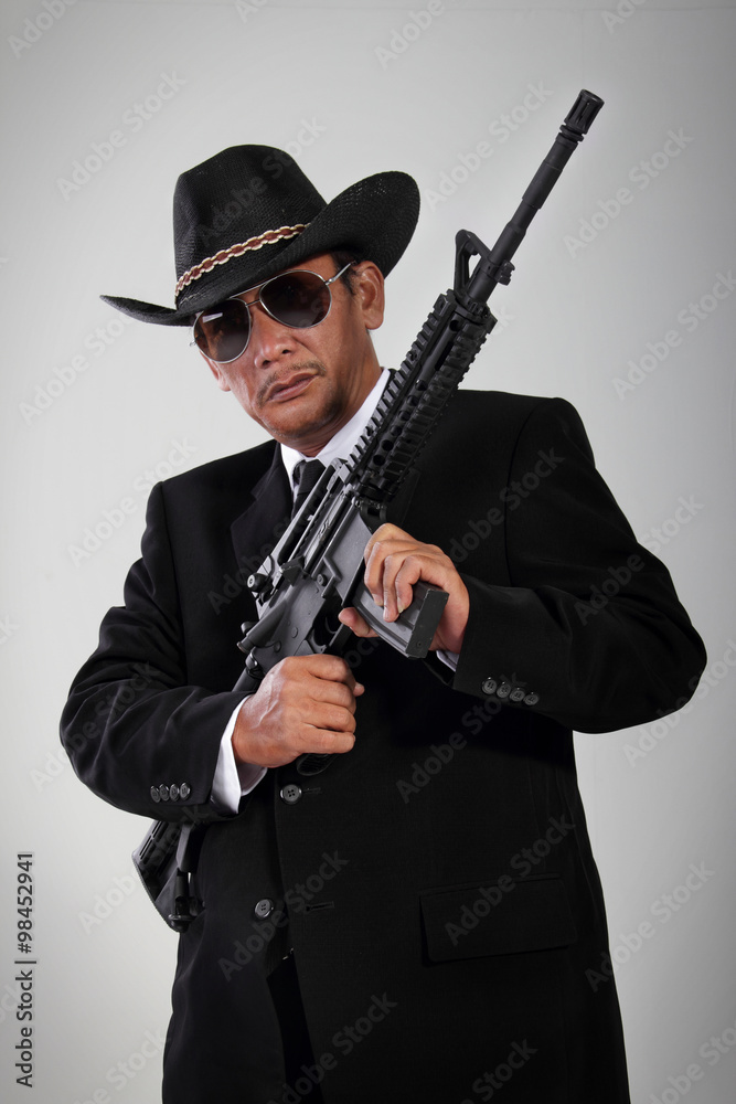 Old gangster portrait with machine gun Old gangster portrait with machine gun