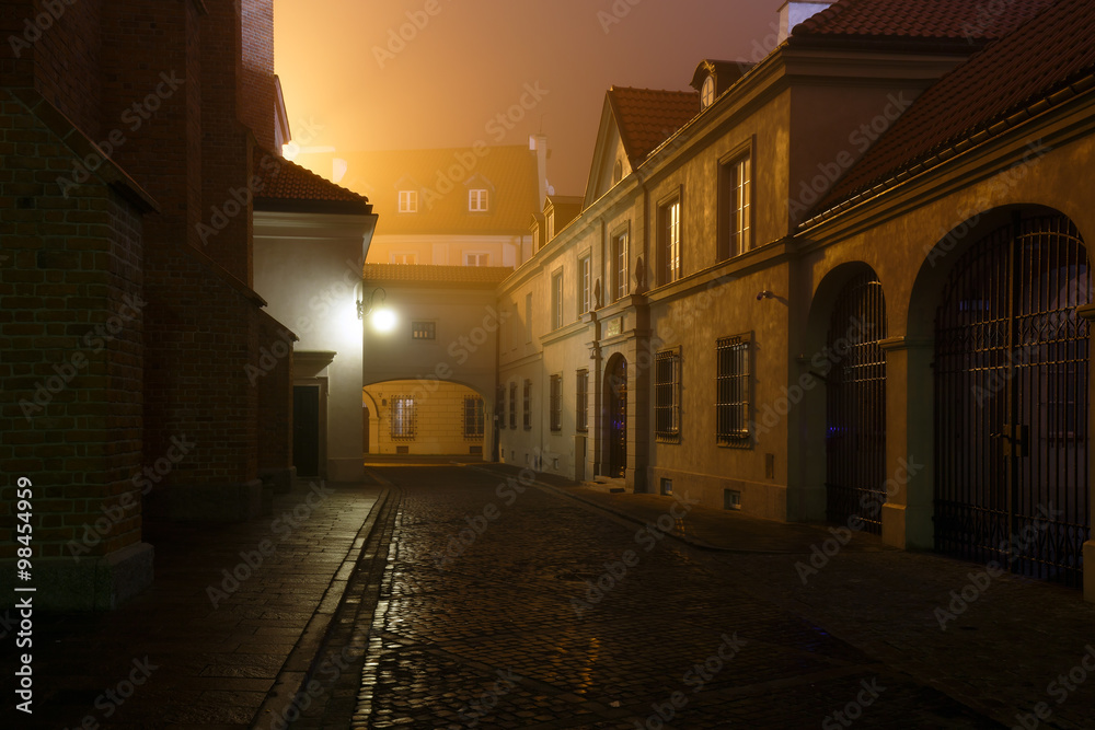 Street of the old city in Warsaw at night