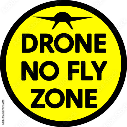 Circular bold Drone No Fly Zone sign in yellow and black