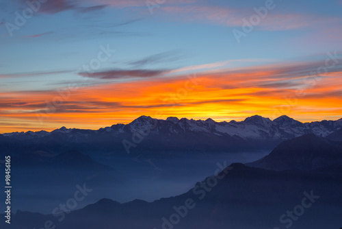 Mountain silhouette and stunning sky at sunset
