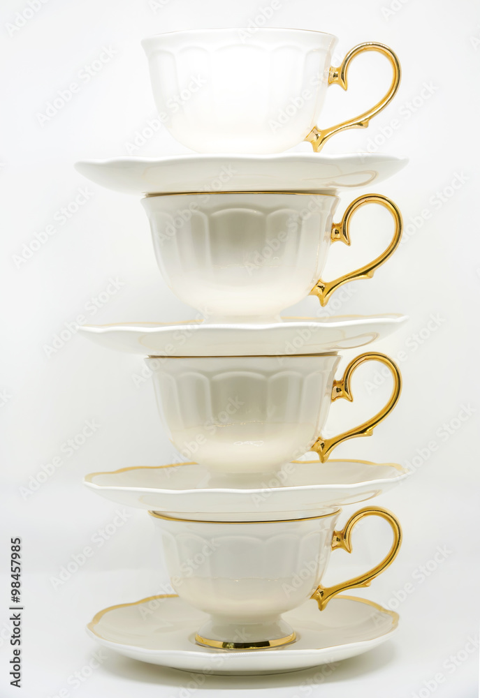 stack of porcelain tea cups on white background stack of porcelain tea cups on white background