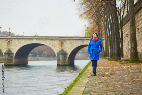 Beautiful young tourist in Paris on a fall or spring day © Ekaterina Pokrovsky