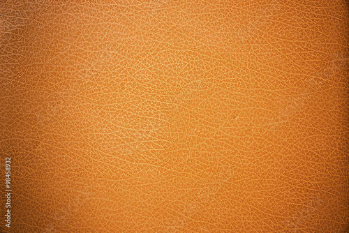 brown leather texture closeup can be used as background.