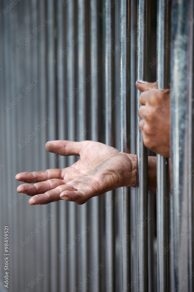 Obraz premium hand in jail