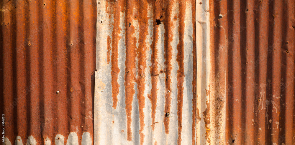 Rusty zinc plate wall for background Rusty zinc plate wall for background