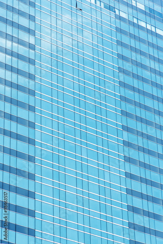 blue glass wall of skyscraper, abstract background.