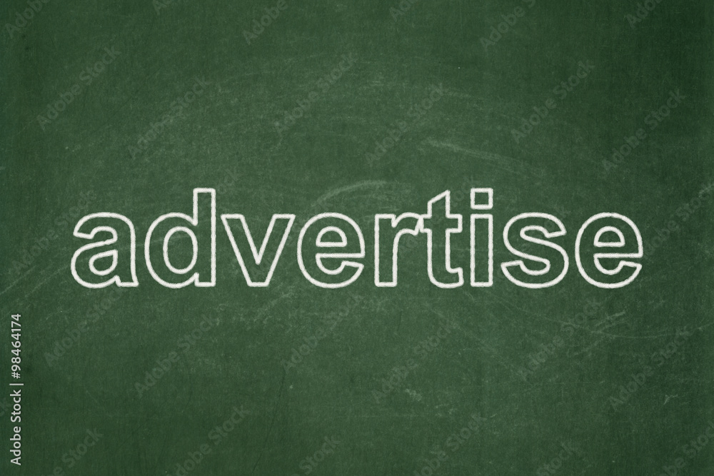 Marketing concept: Advertise on chalkboard background Marketing concept: Advertise on chalkboard background