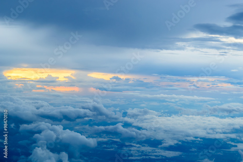 Sunset with clouds view from the window of an airplane