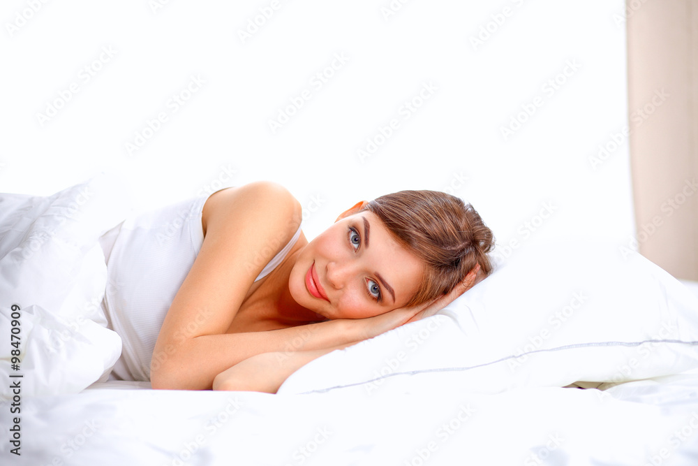 Beautiful girl sleeps in the bedroom, lying on bed Beautiful girl sleeps in the bedroom, lying on bed
