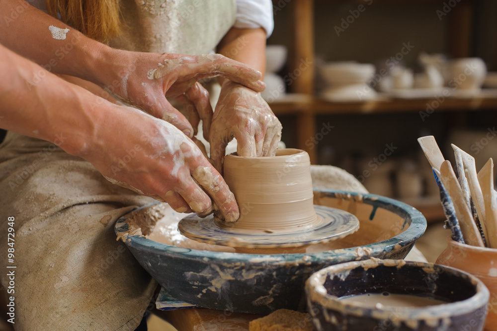 Potter teaches how make clay pot Potter teaches how make clay pot