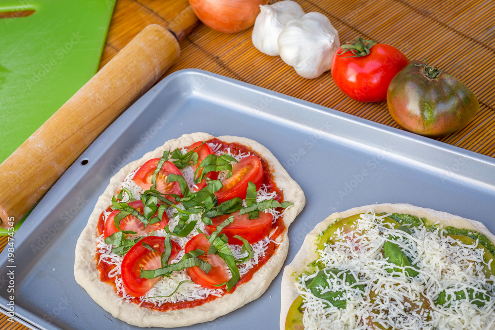 Freshly baked artisan pizza with fresh produce and cheese. Freshly baked artisan pizza with fresh produce and cheese.