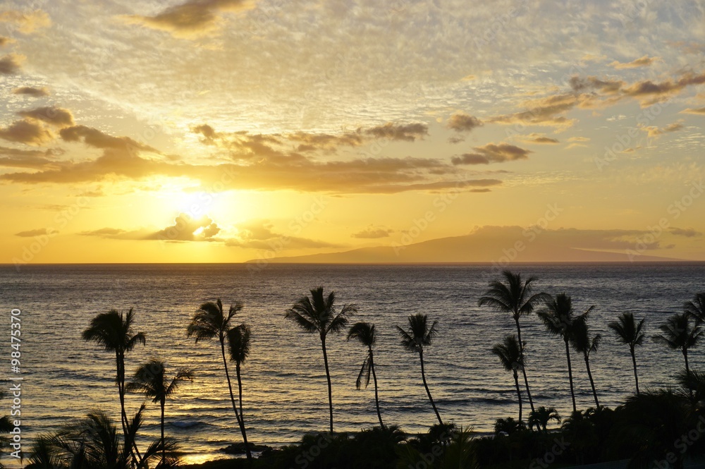 Sunset over the beach in Wailea on the West Shore of the island of Maui in Hawaii Sunset over the beach in Wailea on the West Shore of the island of Maui in Hawaii
