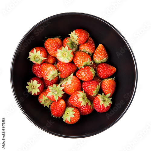 Strawberries in black blow.