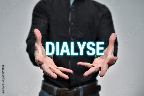 Man holding dialysis, lettering