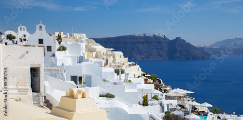 Santorini - The look from Oia over luxury resorts to east with the Skaros
