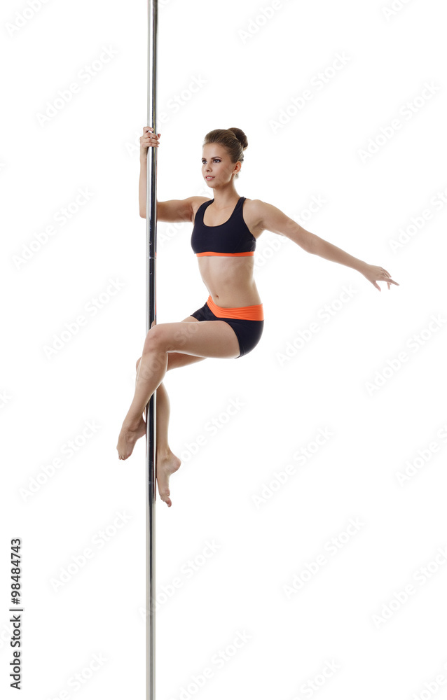 Image of cute dancer exercising on pylon Image of cute dancer exercising on pylon