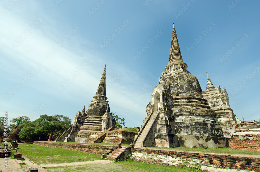 Old pagoda with cloudy sky in Thailand