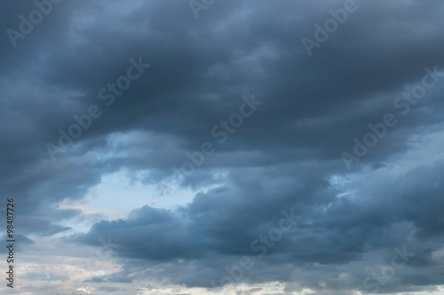 heavy rain storm clouds, thunderstorm dramatic sky © sutichak