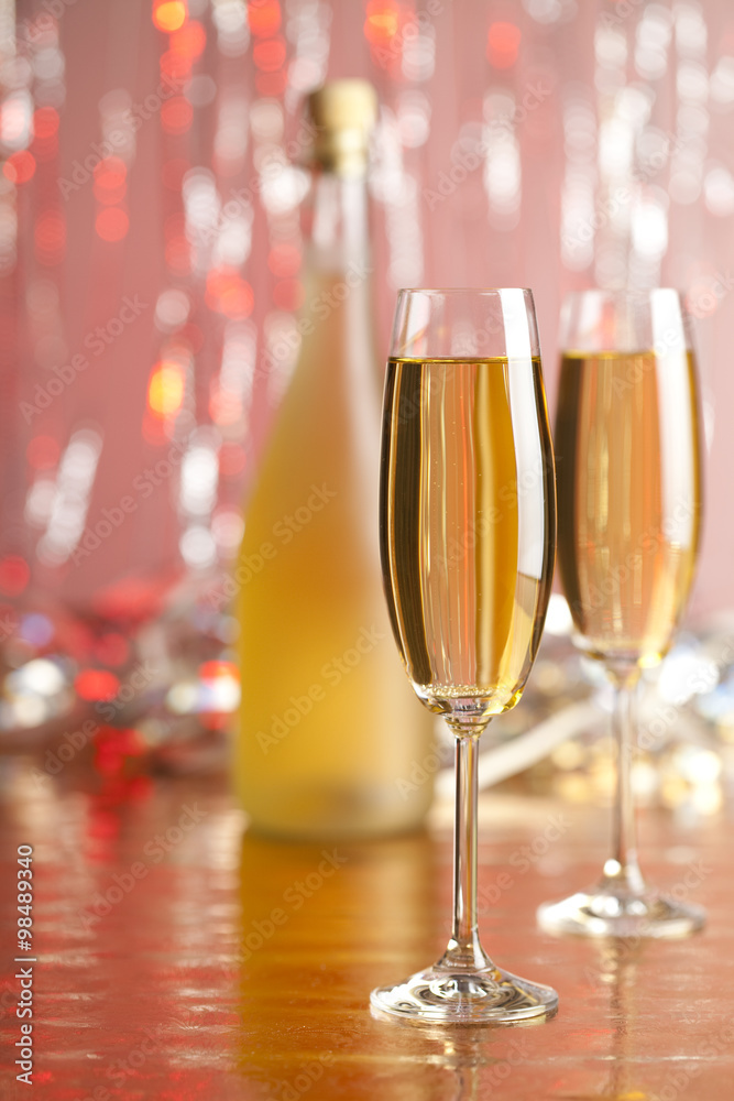 Happy new year - champagne on shining background Happy new year - champagne on shining background
