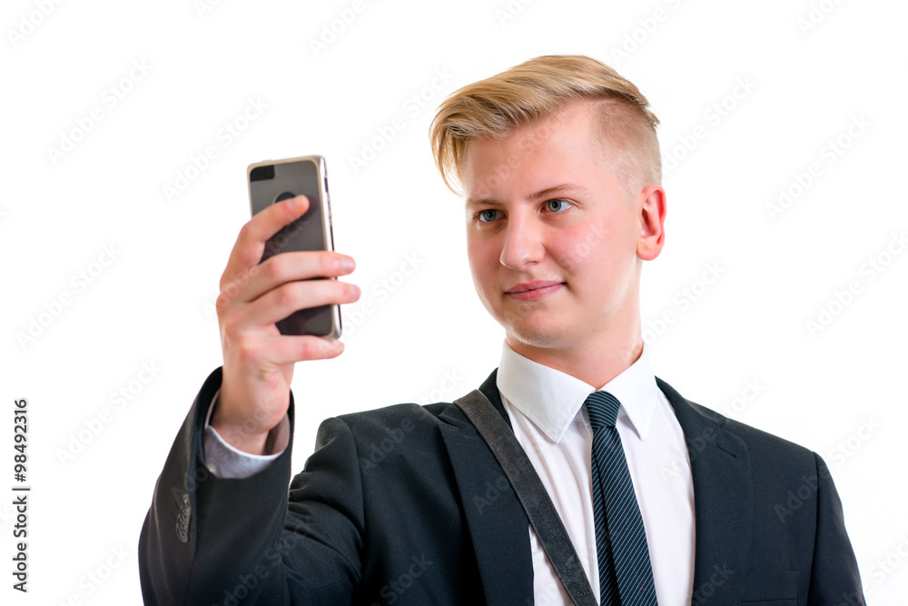 business man in black suit taking a self-portrait with his phone business man in black suit taking a self-portrait with his phone