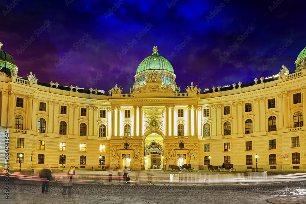 Hofburg Palace seen from Michaelerplatz, wide-angle view at dusk