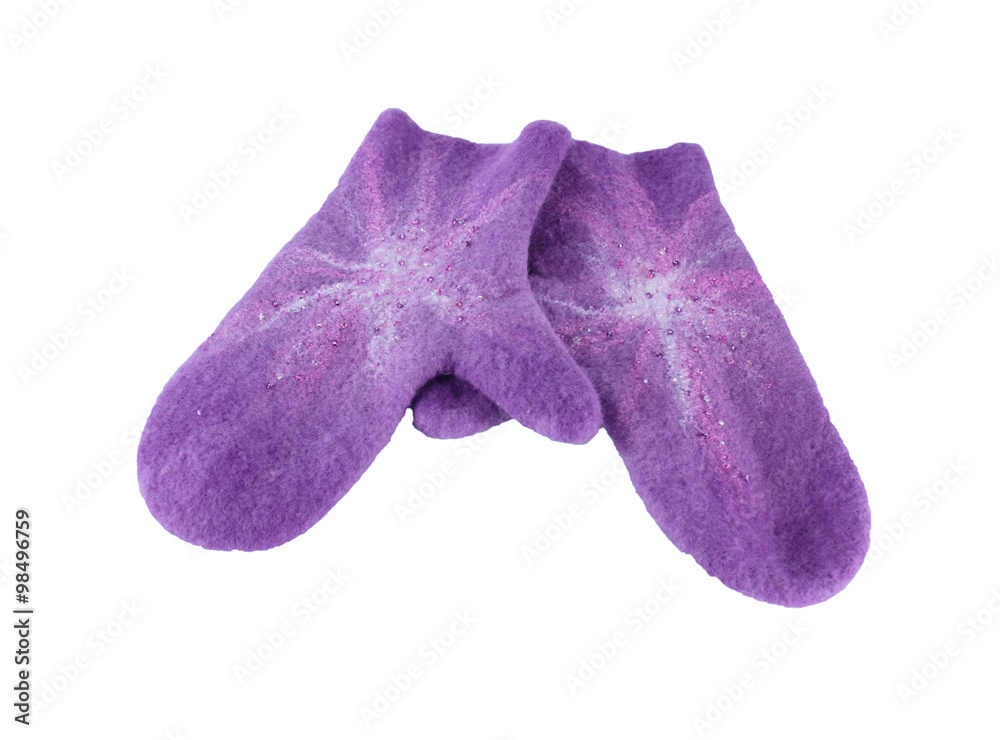 warm women's mittens on a white surface StockFoto Adobe Stock