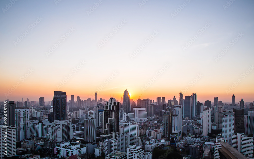 this is Cityscape and sunset at evening time