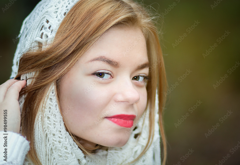 young beautiful girl in a white scarf
young beautiful girl in a white scarf