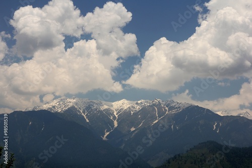 Blue sky with clouds background in mountains. Himalai, India photo