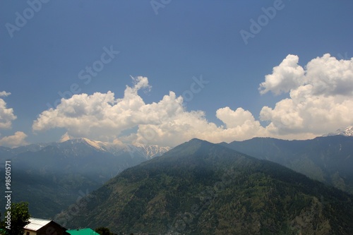 Blue sky with clouds background in mountains. Himalai, India