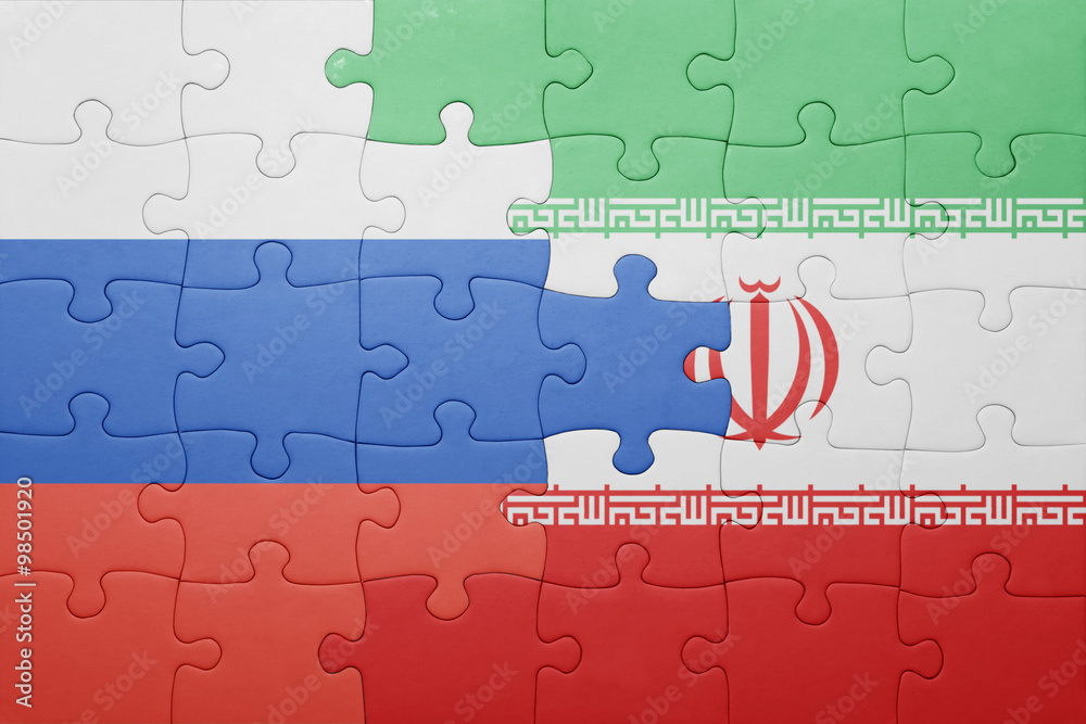 Fototapeta premium puzzle with the national flag of russia and iran