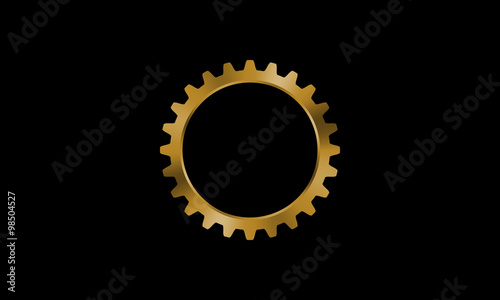 Golden gear on black background.
