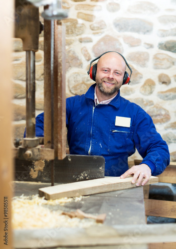 employee works on the machine