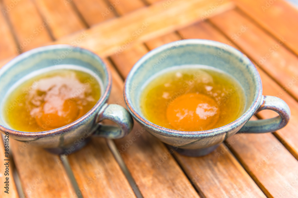 Norman apple cider in a typical ceramic cups Norman apple cider in a typical ceramic cups