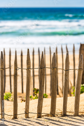Wooden fence on an Atlantic beach in France