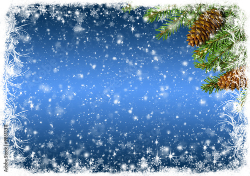 Blue Christmas background with white frost and branches of spruc photo